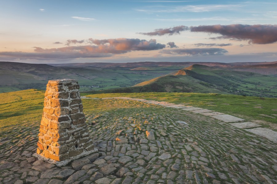 Neat stone marker on cobbled ground at Mam Tor peak, Derbyshire