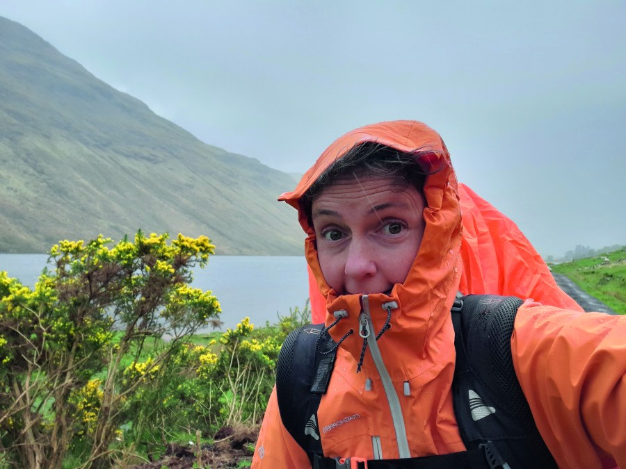 Selfie in the rain, orange rain jacket is soaked