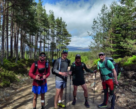 walking group posing on a the trail for a photo