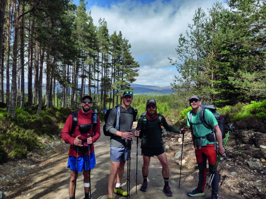 walking group posing on a the trail for a photo