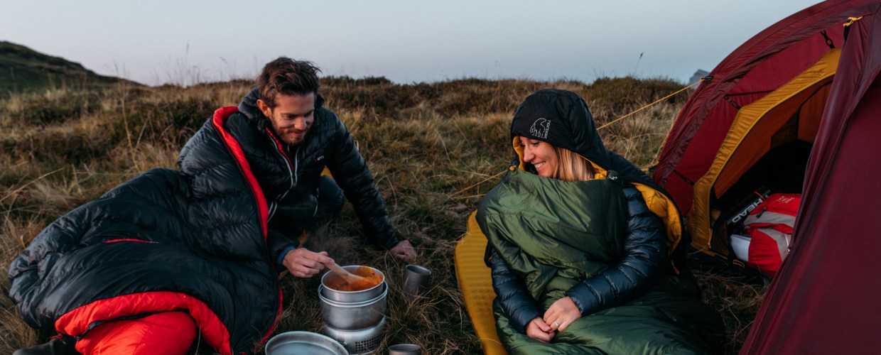 A couple testing out types of sleeping bag