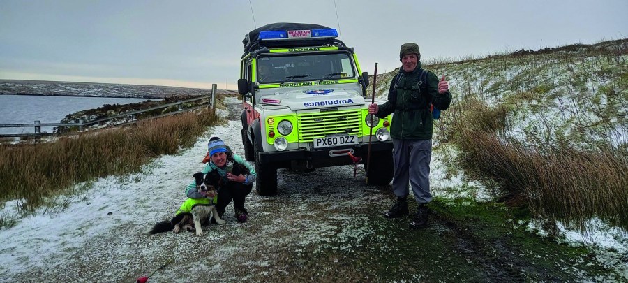 Jackie Cooper with Search & Rescue dog and Peter Smith at the South Pennine 24 CP1 at Chew Reservoir. (Credit_ Mick Cooper)