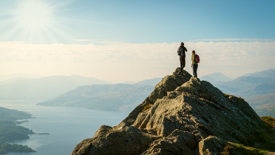 Two female hikers on top of the mountains