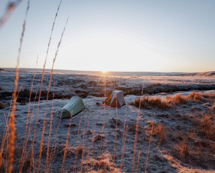 The sun rises over a perfect Dartmoor wild camp.