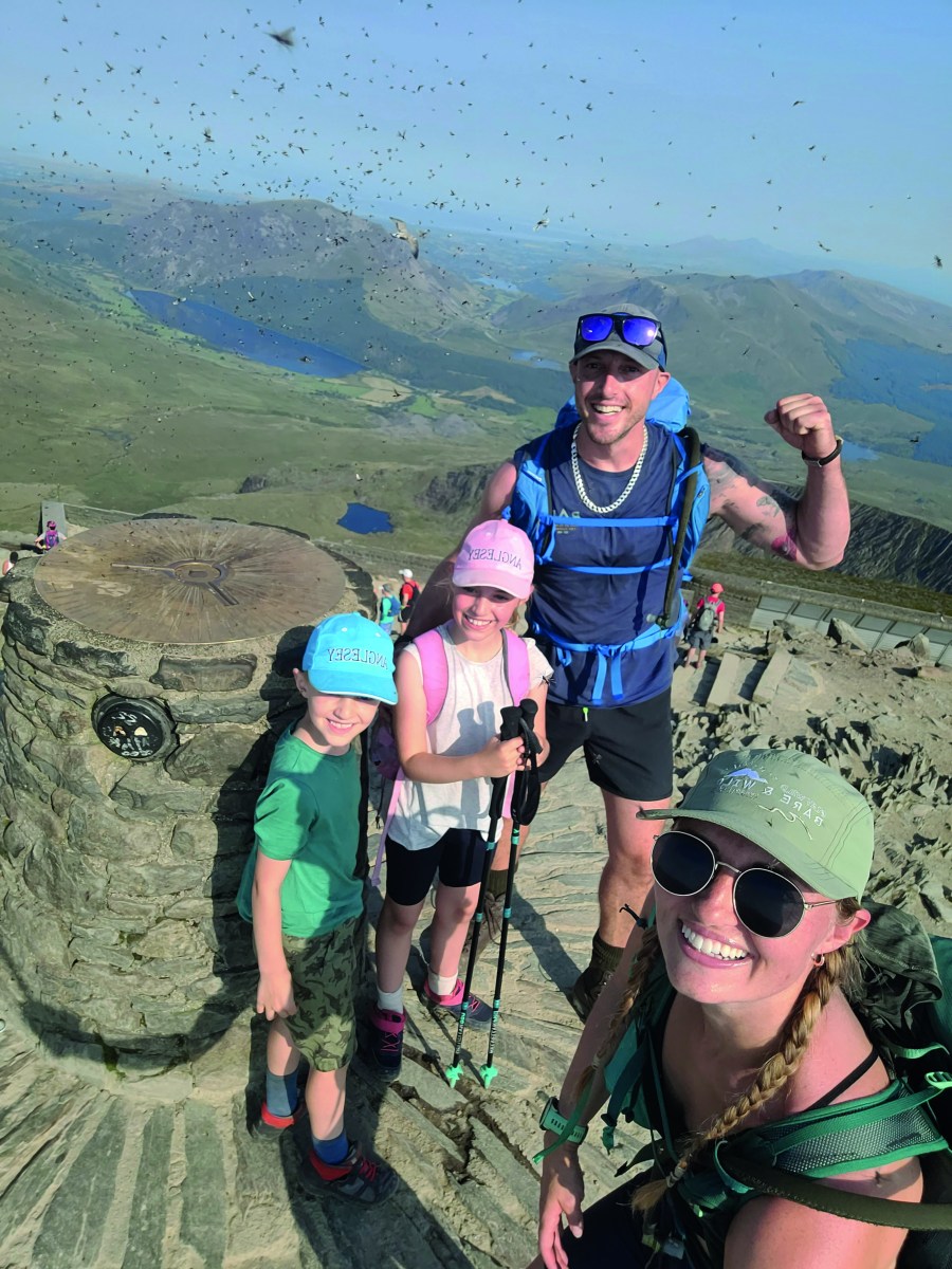 Emily's children summiting Yr Wydffa for the first timeCredit: Emily Taylor/@trigsandteeth