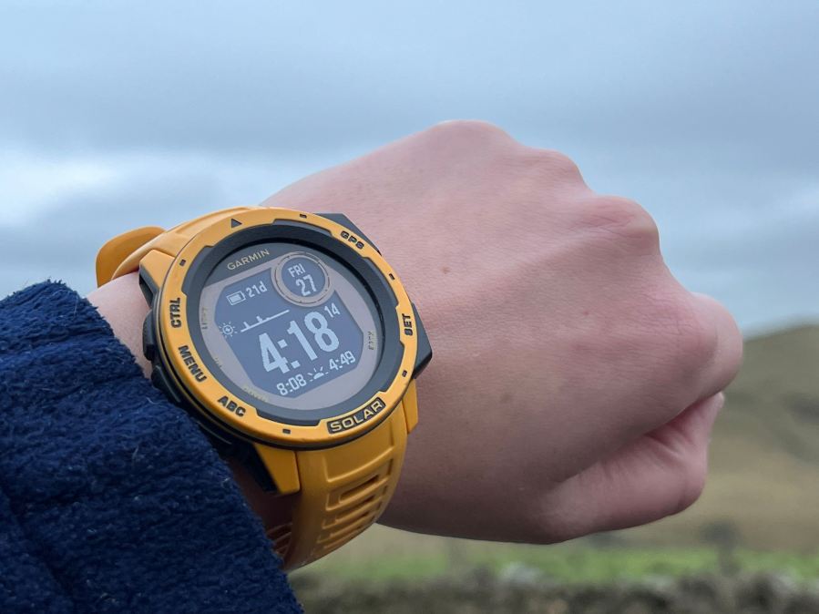 yellow garmin solar gps watch