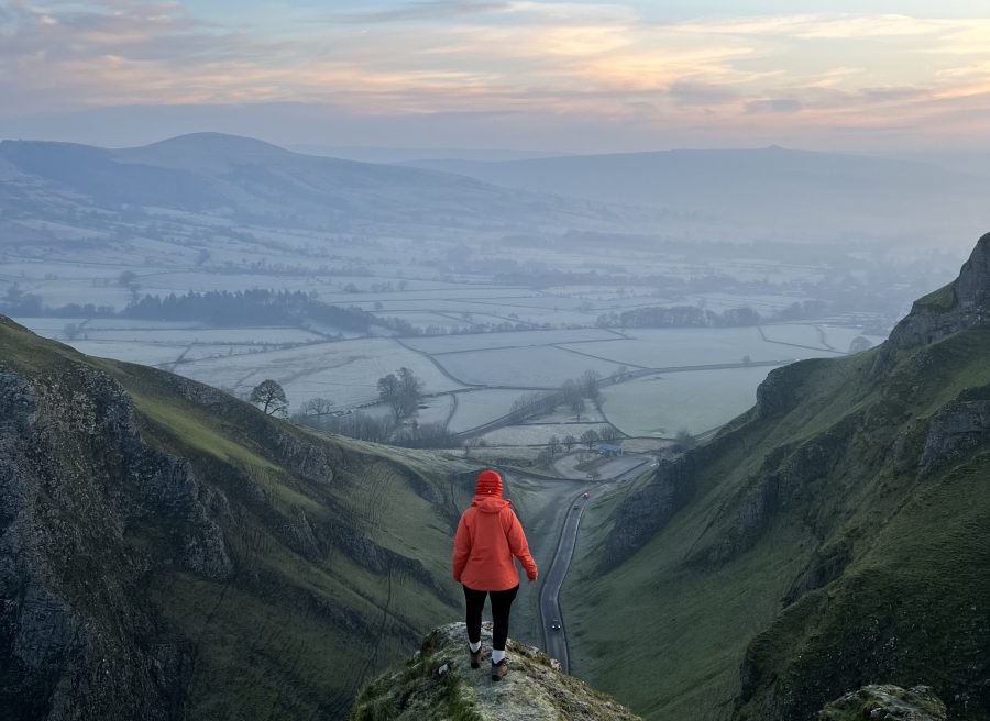 A hiker on Winnats Pass, one of the most romantic walks in the Peak District