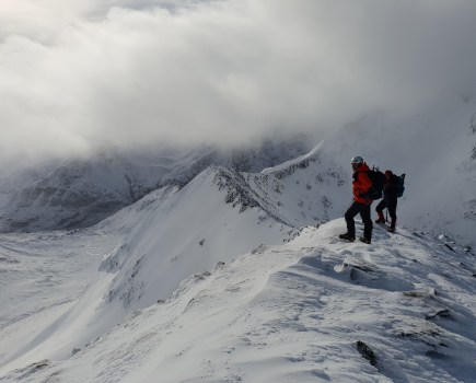 Climbers enjoying the view before the cloud on Ben Nevis CMD arete