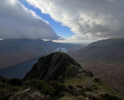 `Yewbarrow_A hiker ooking southwest beyond Bell Rib to Wast Water