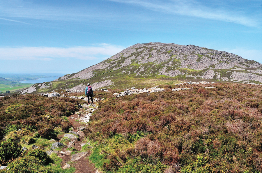 3: Looking west to Garn Ganol , the highest summit of the Ye Eifl group, from the path to Tre’r Ceiri.JPG