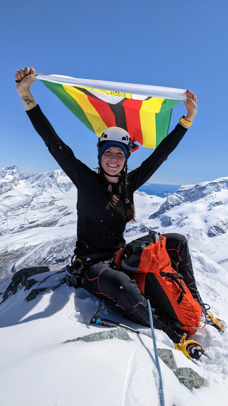 Kate Sielmann on summit of Breithorn Orientale