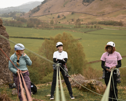 Women climbing on the Intro to Trad course at the Arc'teryx Academy in the Lake District