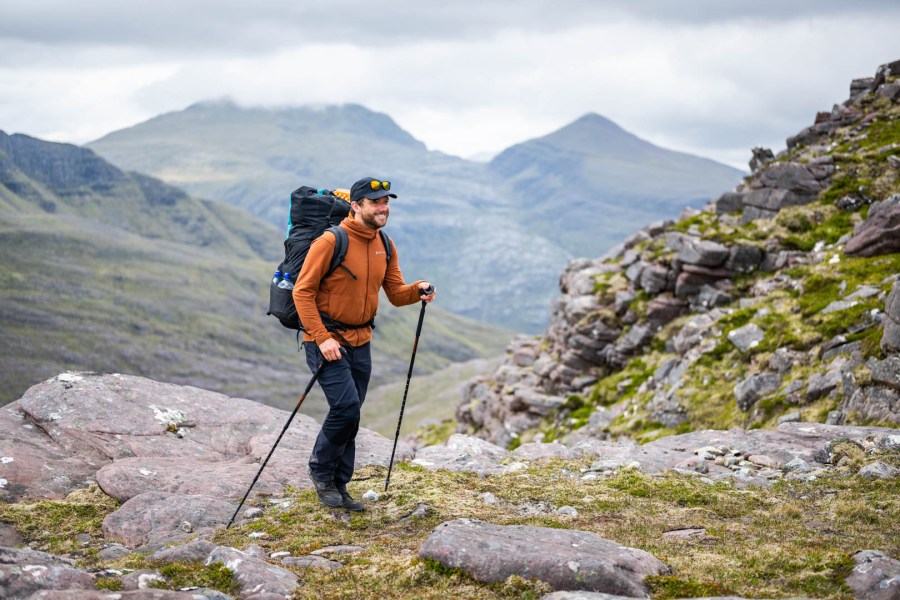 trekking poles in use in the mountains