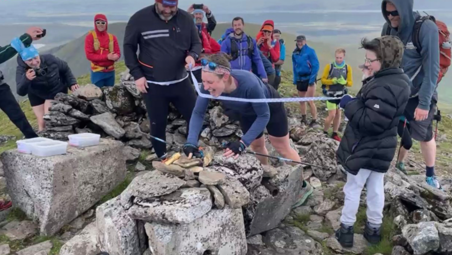 The exact moment Jamie Aarons broke the record for a self-propelled Munro round.