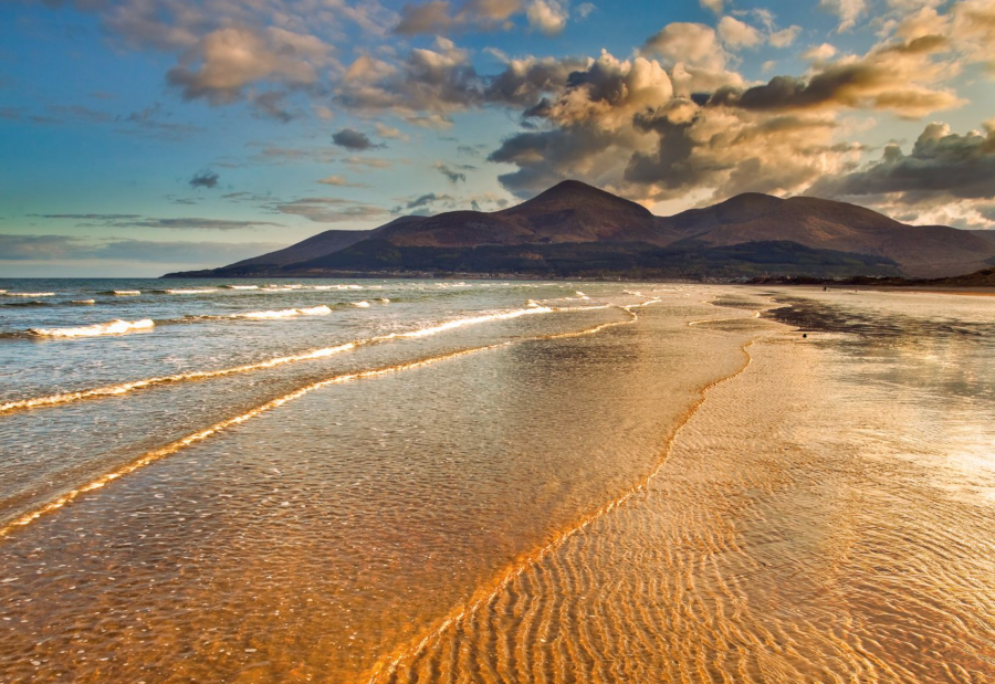 Slieve Donard spectacularly overlooks the beach at Newcastle. Credit: Shutterstock