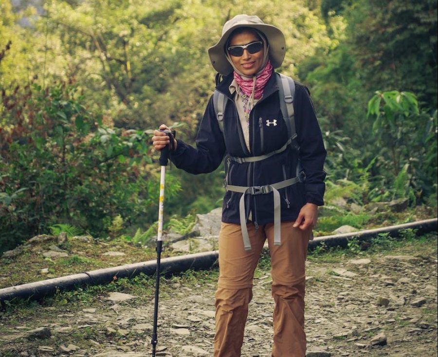 woman hiking with single pole in Annapurna