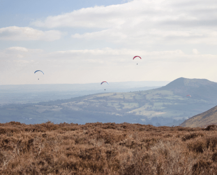 12. The Skirrid from Hatterrall Hill, with paragliders.JPG