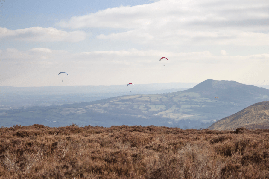 12. The Skirrid from Hatterrall Hill, with paragliders.JPG