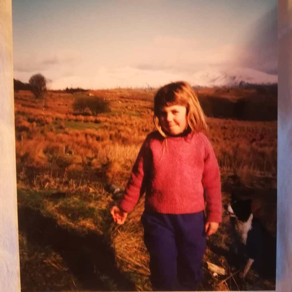 Jenny as a bairn in the Cairngorms with her dog, Meg and fleece trousers she remembers fondly