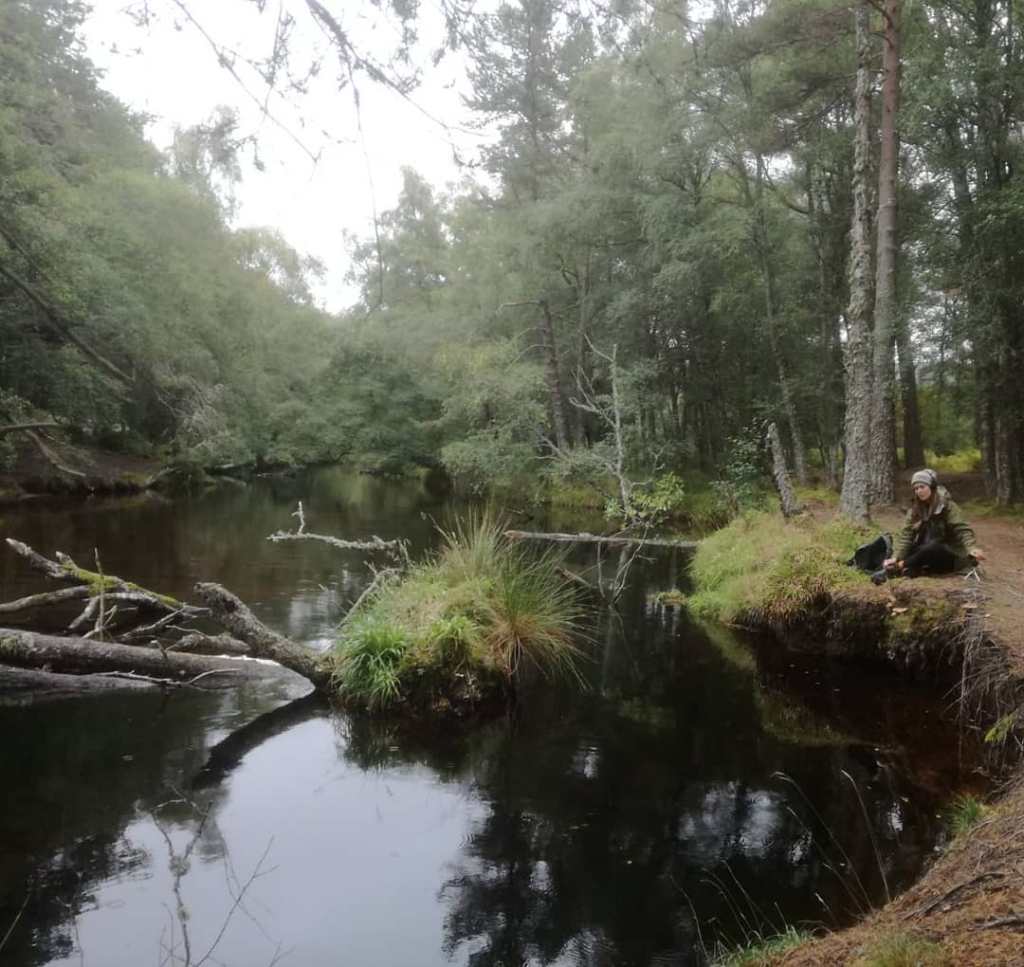 Jenny Sturgeon Sampling the sound of water flowing in to Loch Eilein.