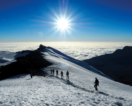 Hikers above the clouds of Kilimanjaro.