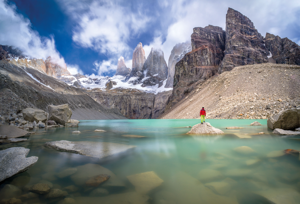 admiring 3 peaks at Base de las Torres viewpoint in Torres del Paine, Patagonia