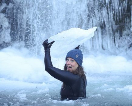 Vicki McCreadie in a frozen waterfall