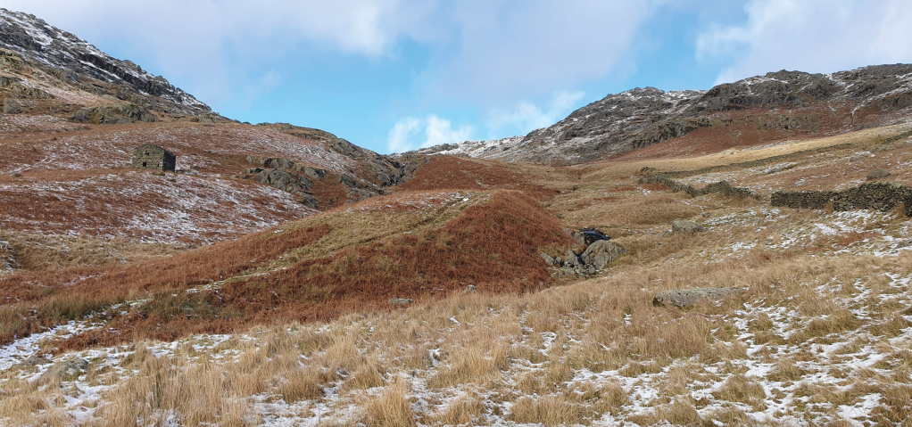 Looking up Woundale, with the romantic ruin on the left, the ascent via the tongue and col in the middle and the descent coming in via the wall on the right.