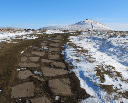 10 Snow melt on the paved path to Shutlingsloe