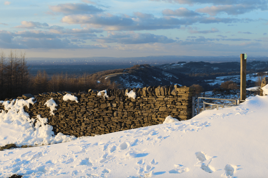 22 On the Gritstone return with views to Manchester