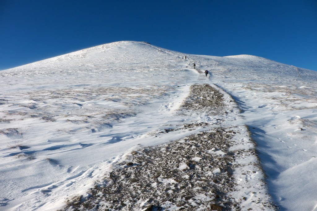 Walkers on the path climbing Skiddaw Little Man from wp3. Credit: Vivienne Crow