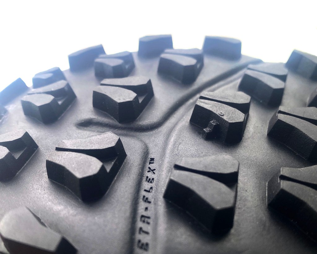 The ROCLITE mountain goat cleats and wear indicator. Credit: INOV8