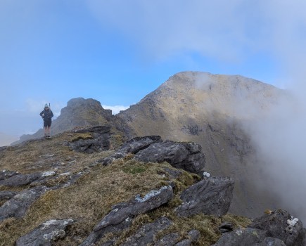Wander Wild - Our second guide strikes an accidental pose before the final ascent to Carrauntoohil. Credit: Francesca Donovan