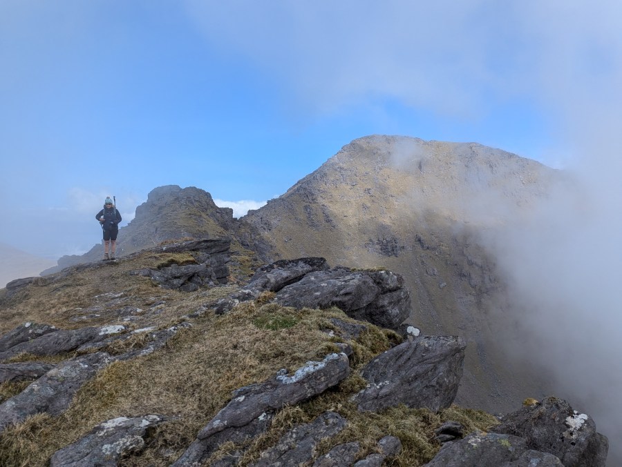 Wander Wild - Our second guide strikes an accidental pose before the final ascent to Carrauntoohil. Credit: Francesca Donovan