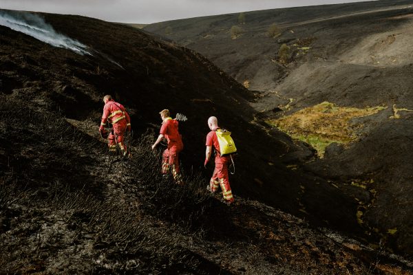 Firefighters from Cheshire Fire and Rescue service continue to work to tackle a large moorland fire near Errwood Reservoir in the Goyt Valley, near Buxton in the Peak District. Derbyshire, England. 3rd May 2025.