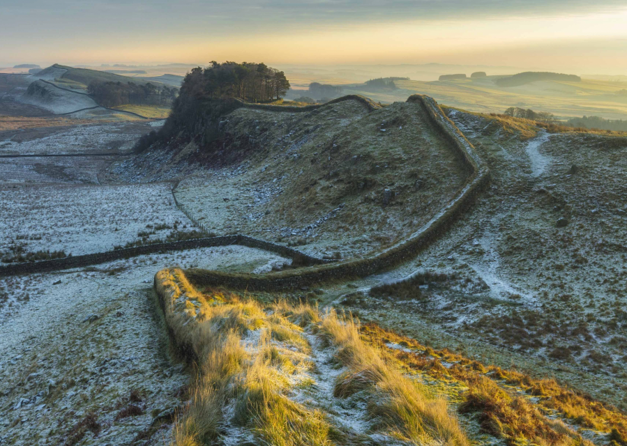 Hadrian's Wall runs across the volcanic outcrop of the Whin Sill in Northumberland national park. Credit - Guy Edwardes:naturepl.com