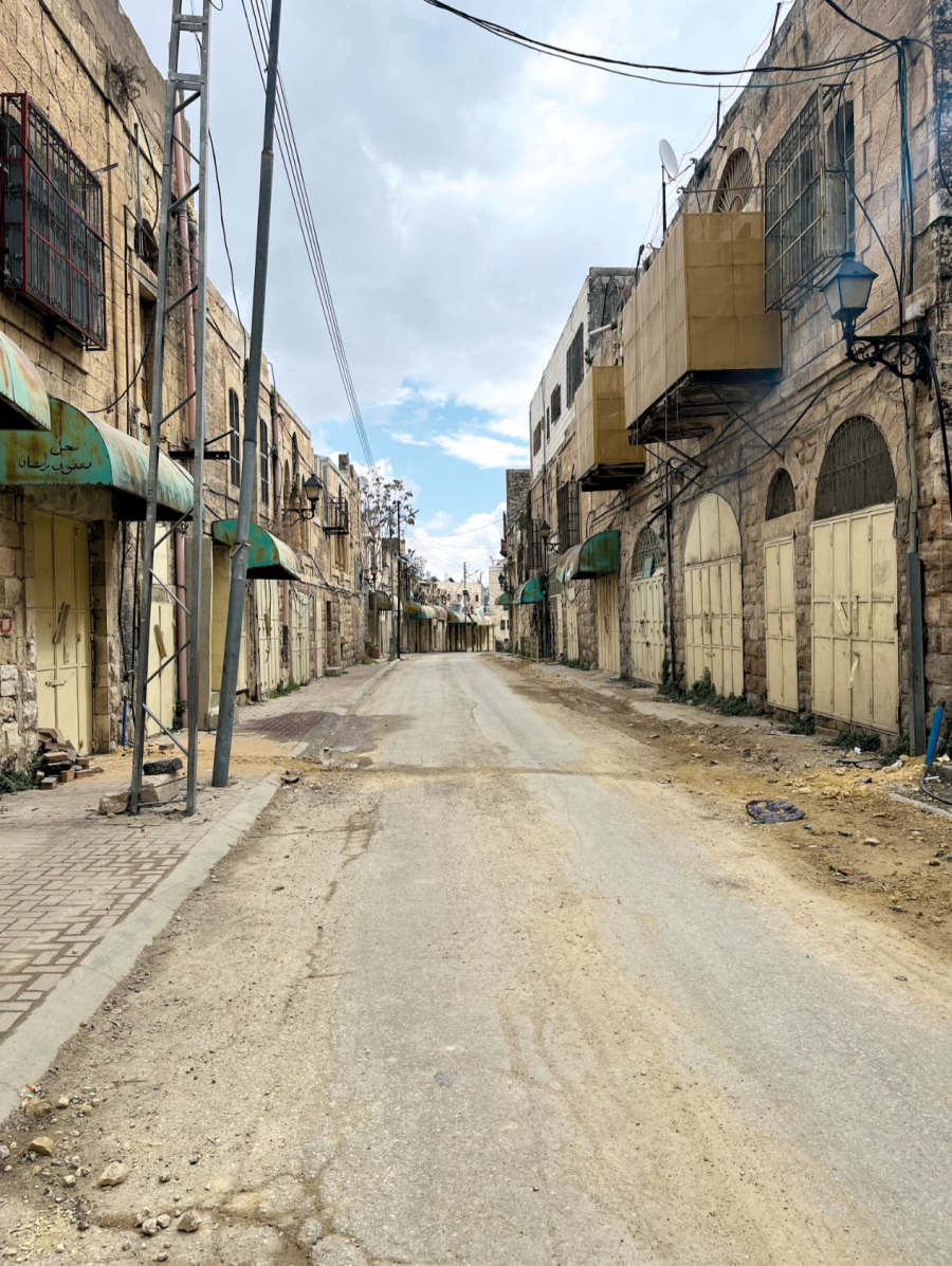Al-Shuhada Street in Hebron, Palestine was the main market street in town before Israeli occupation. Credit: David Myers
