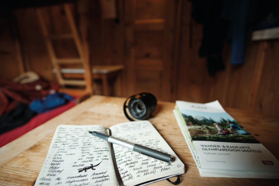 Writing up my trail journal at Pfeishütte after a quiet but vivid day