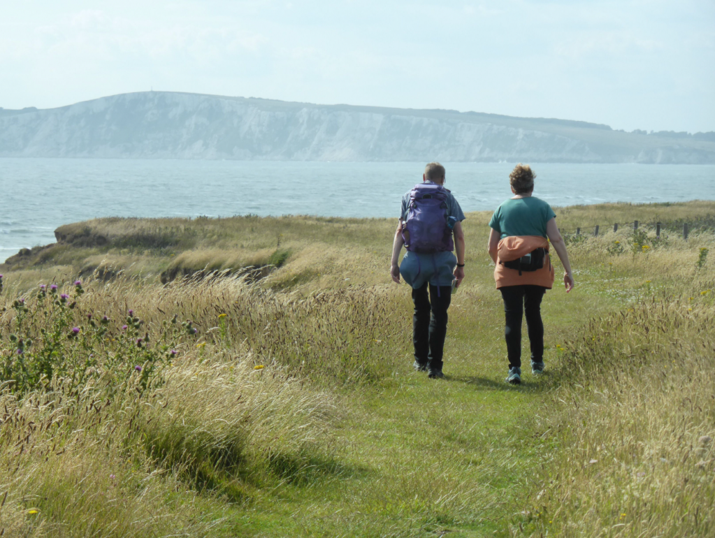 Walkers on the Coastal Path, Tennyson Down in the distance (2)