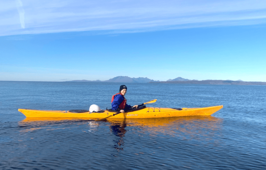 Sea kayaking and hooked on adventure. Credit: Meg Strong