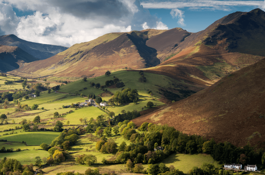 A typical Lakeland patchwork of pastures, woods and open fellsides in the Newlands Valley. Credit - Ross Hoddinott:naturepl.com