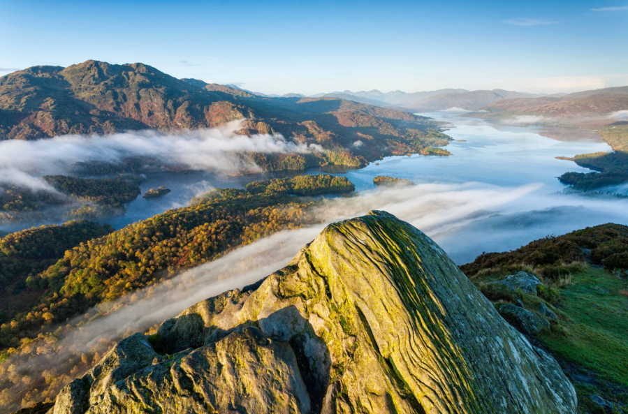 1. *DPS*Loch Katrine from Ben A’an, with the Trossachs forest at its blazing autumn best. Credit - Guy Edwards:naturepl.com