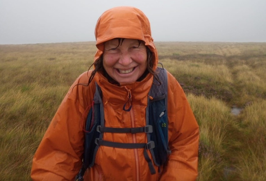 3.Lorraine still smiling on Andrew Whinney Hill, 4th hill of the day and torrential rain from start to finish. Credit Chris Huntley