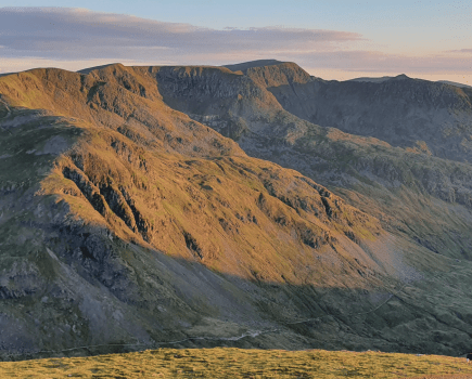 In this dawn view from Fairfield, the ridges of Dollywaggon and Nethermost Pikes show in profile