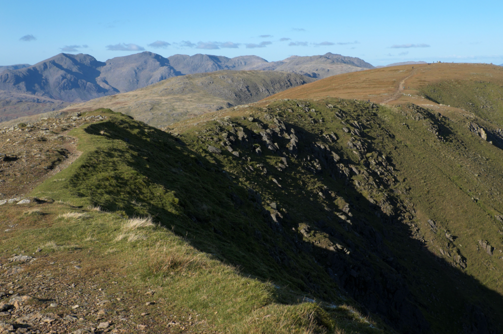 From the Old Man, the Scafell range forms a rugged skyline to the northwest. Credit: Vivienne Crow