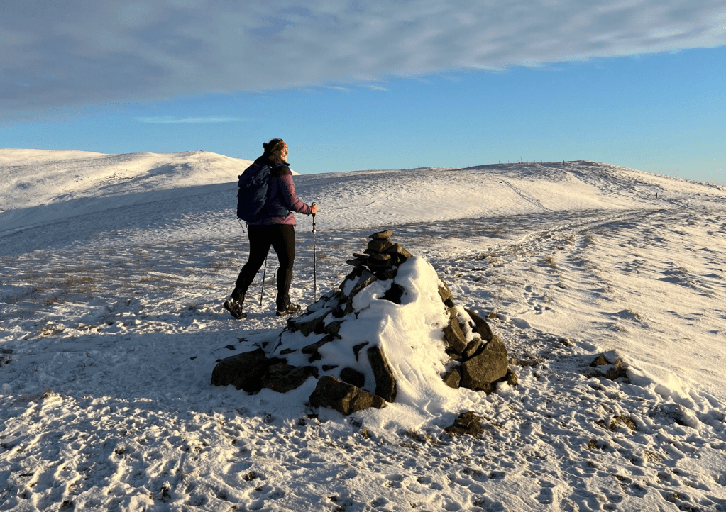 Walking into sunrise on Castle Knott