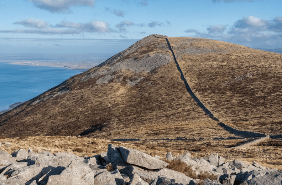 Gyrn Goch with Dinas Dinlle and Caernarfon Airfield in the distance