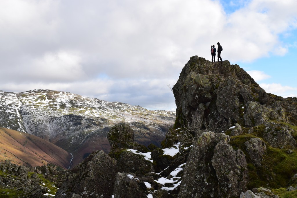 Two hikers on The Lion and The Lamb outcrop 2Credit: James Forrest