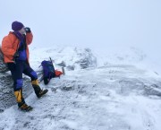 Vinted hiking gear haul -The purple prince warms up with a brew. Credit: Peter Macfarlane
