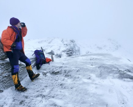 Vinted hiking gear haul -The purple prince warms up with a brew. Credit: Peter Macfarlane